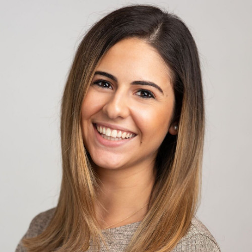 a woman smiling at the camera