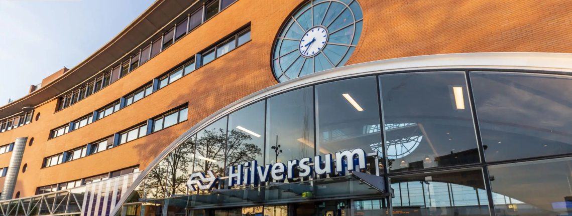 a building with a clock on the side
