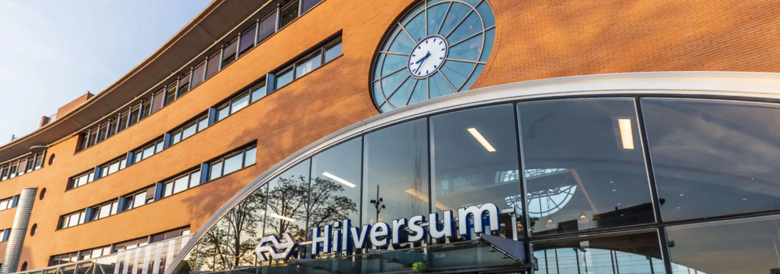 a building with a clock on the side