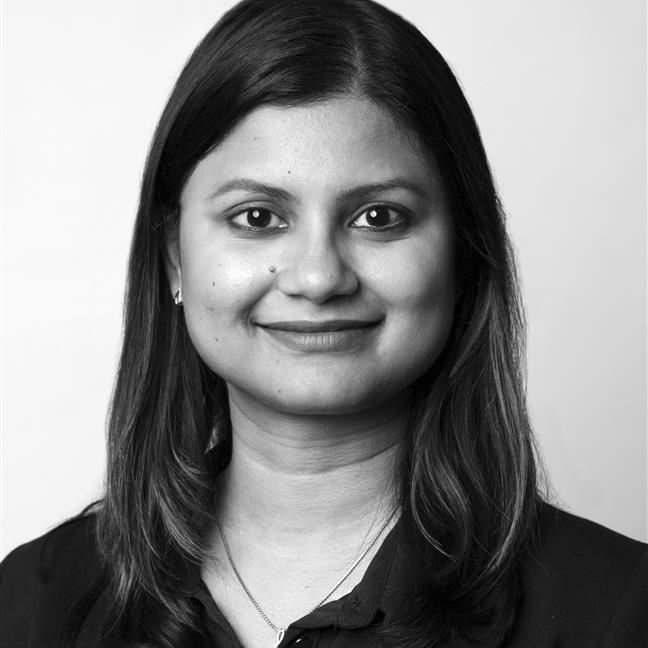 a woman with long hair smiling