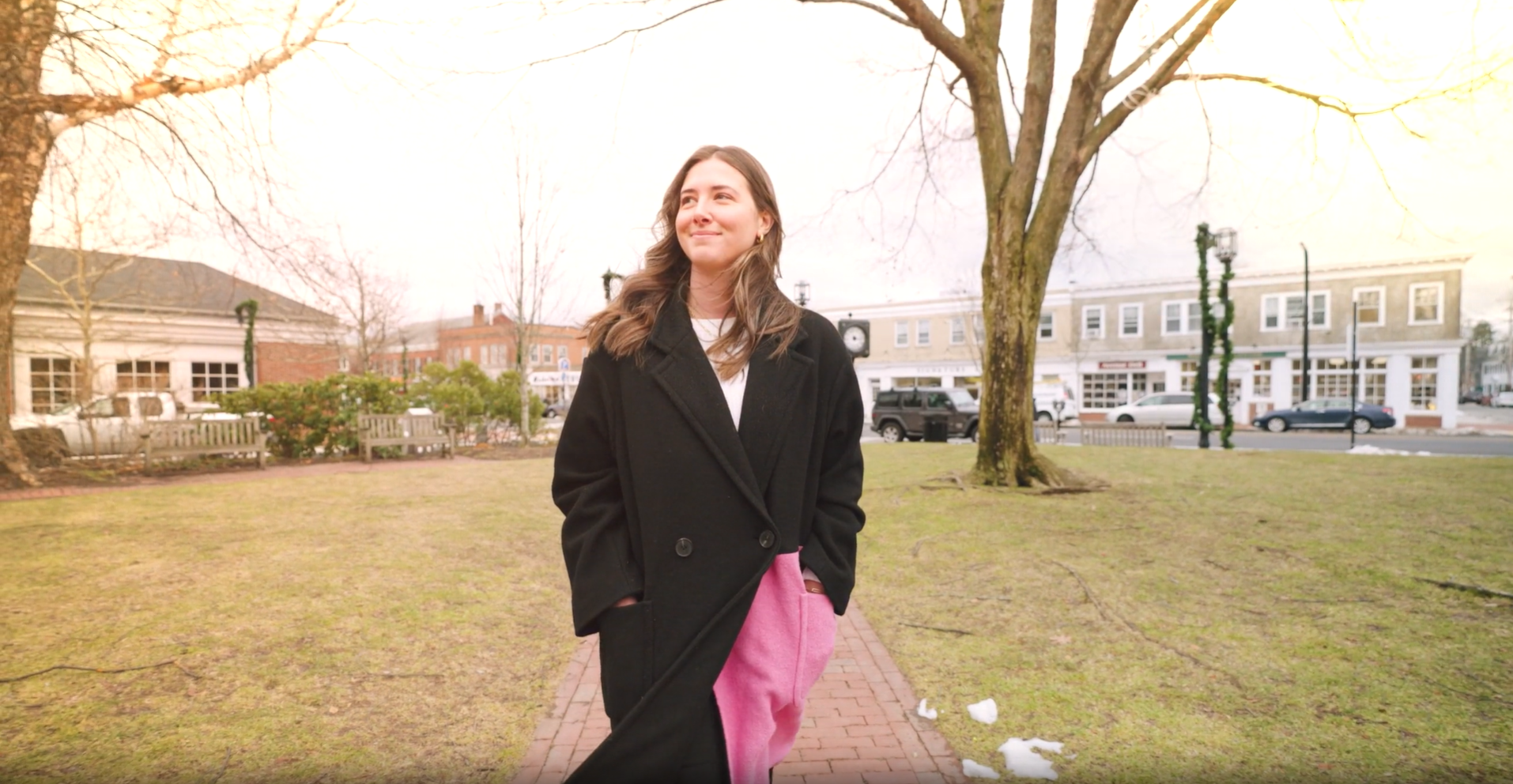 a woman in a black coat