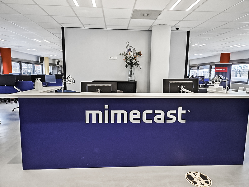 a blue and white reception desk