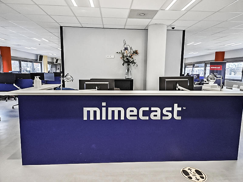 a blue and white reception desk