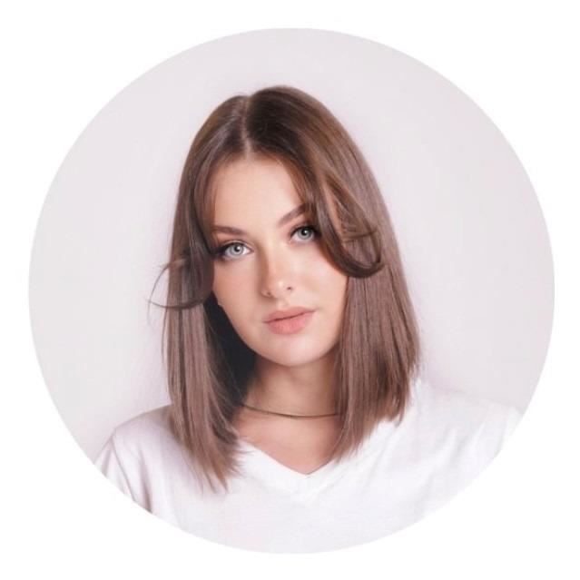 a woman with short brown hair