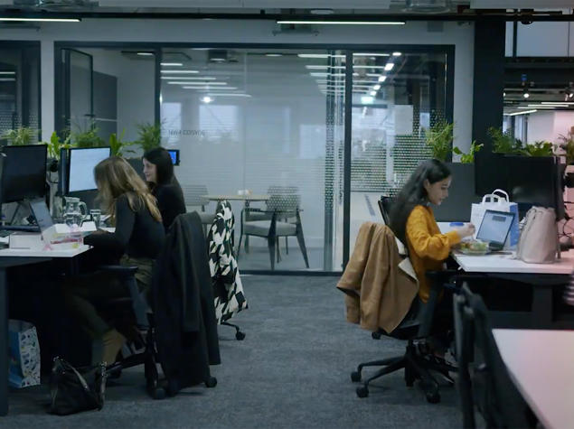 a group of people sitting at a table