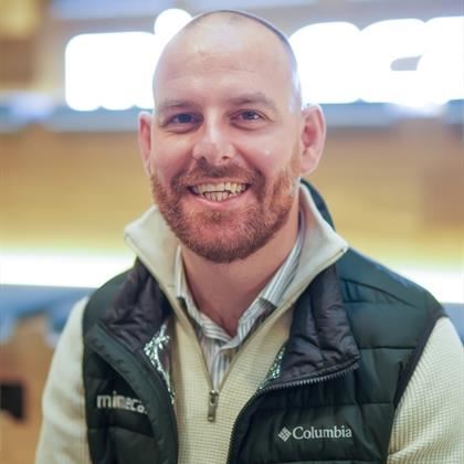 a man smiling for the camera