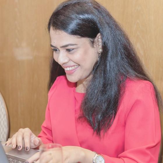 a woman in a pink shirt